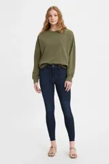 Pantalón de jean azul oscuro, corte super skinny y tiro alto.