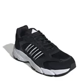 Championes urbanos Adidas modelo Crazy Chaos 2000, color negro con detalles en blanco. Presentan una combinación de malla y material sintético, con las icónicas tres tiras laterales y entresuela con tecnología Cloudfoam para mayor amortiguación.