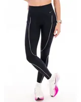 Calza deportiva Nike Go negra con ribetes reflectantes, pretina ancha, tecnología Dri-FIT y múltiples bolsillos.