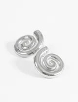 Aros caravanas de acero quirúrgico hipoalergénico con diseño de espiral tridimensional.