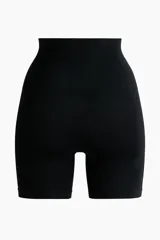 Culotte de punto color negro, de tiro alto, con efecto moldeador en cintura y caderas, y efecto push-up en los glúteos. Diseñado con el mínimo de costuras para un ajuste cómodo y una sensación suave.