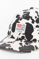 Gorra de béisbol con estampado de vaca en blanco y negro, con parche frontal de Levi's Western Wear y Pixar.