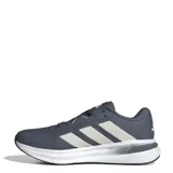 Championes de running Adidas Galaxy 7 para hombre, en color gris oscuro con las icónicas tres tiras laterales en tono gris claro. Presentan una capellada de tejido técnico transpirable y una entresuela Cloudfoam que brinda amortiguación superior, con suela de goma resistente.
