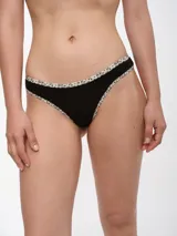 Colaless negra con ribete estampado animal print.