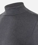 Blusa de manga larga de tejido melange en tono verde oliva, con cuello alto y calce ajustado.