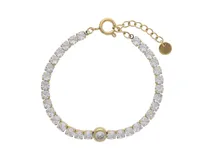 Pulsera dorada de acero con baño de oro y circonias blancas.