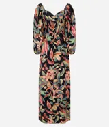 Vestido midi de corte evasé con estampado de follaje tropical sobre fondo negro. Presenta escote corazón, mangas abullonadas y un diseño fluido confeccionado en viscosa.