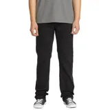 Pantalón jean Volcom modelo Solver Denim, de corte recto y color negro, confeccionado con tejido elástico.