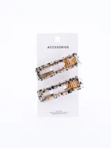 Set de dos broches rectangulares para el pelo con glitter multicolor y base dorada.