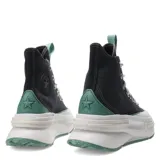 Championes de caña alta Converse Run Star Legacy CX, con diseño de plataforma voluminosa, capellada de lona negra, detalles en verde agua y suela dentada con textura moteada.