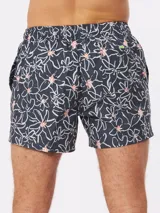 Short de baño Rusty de color gris oscuro, con estampado de flores blancas y cordón ajustable en la cintura.
