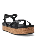 Sandalias de plataforma con suela de corcho y tiras cruzadas en el empeine, con cierre de pulsera ajustable al tobillo.