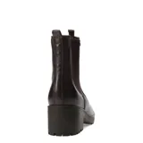 Botas de caña media marca Bottero, confeccionadas en cuero marrón con textura granulada. Presentan paneles laterales elásticos, suela track con plataforma y taco cuadrado.