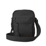 Morral Rip Curl Everyday Mini X Body de color negro, confeccionado en poliamida, con diseño compacto, correa ajustable para el hombro, bolsillos frontales con cierre y detalle de aplique metálico circular en la parte inferior.