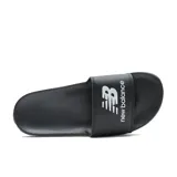 Ojotas negras New Balance con logo blanco en la tira.