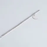 Pulsera de eslabones tipo rolo en plata 925, con un dije colgante en forma de corazón liso apto para grabado.