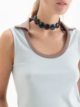 Musculosa de algodón pima, con cuello redondo y ajuste al cuerpo.