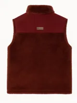 Chaleco color crudo con parte superior en pana marrón, cierre frontal con cremallera, cuello alto y dos bolsillos delanteros.