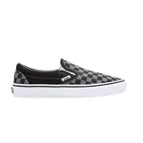 Zapatillas Vans Classic Slip-On con estampado a cuadros en blanco y negro, con suela de goma blanca.