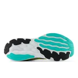 Championes New Balance 680, color gris con detalles en negro y amarillo, con tecnología Fresh Foam en la entresuela.