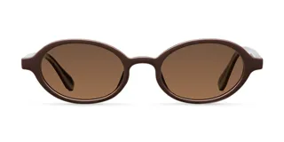 Lentes de sol con montura ovalada de color marrón chocolate y lentes polarizadas en tono marrón. Presentan un diseño de bordes finos y definidos con protección UV400.