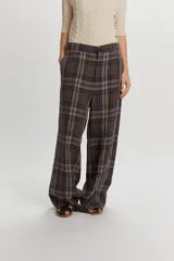 Pantalón de lino y viscosa con estampa a cuadros en tonos marrones y azules, de tiro medio y corte wide leg.