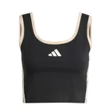 Musculosa deportiva Adidas de corte crop, color negro con detalles en beige en los bordes del cuello y sisas. Presenta el logo de la marca estampado en el centro del pecho.