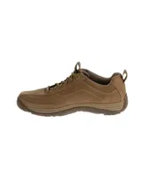 Zapatos de estilo casual de la marca Caterpillar, modelo Cognizant, confeccionados en nobuk color marrón con cordones tono sobre tono y suela de goma texturizada. Presentan detalles de la marca grabados en el lateral y la lengüeta.