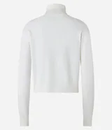 Blusa básica de punto marca Blue Steel, con cuello alto y manga larga. Confeccionada en tejido de punto recto con textura suave y cómoda.