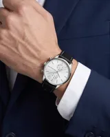 Reloj de pulsera analógico Mini Focus con caja de metal plateado, esfera blanca minimalista con subesferas y correa de cuero negro con costuras blancas.