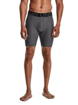 Calza corta de compresión Under Armour, modelo HeatGear, color gris jaspeado. Cuenta con cintura elástica ancha con logo de la marca, paneles de malla para ventilación y un bolsillo lateral de almacenamiento.