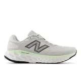 Championes New Balance Fresh Foam X Evoz V4 para running, color gris claro con logo en gris oscuro y detalles en verde claro.