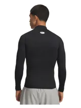 Remera térmica deportiva de compresión Under Armour HeatGear Compression Mock, de color negro, manga larga y cuello alto con el logo de la marca estampado en blanco. Confeccionada en tejido técnico elástico y transpirable.