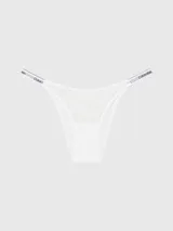 Colaless de tiro medio, color blanco, confeccionado en encaje semitransparente con patrón de leopardo. Presenta ribetes elásticos con el logotipo de Calvin Klein.