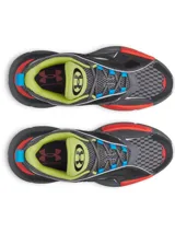 Championes Under Armour modelo UA Arc 96, de diseño chunky y futurista. Combinan tonos grises, negros y plateados con detalles en naranja vibrante, azul y verde lima. Tienen capellada de malla con superposiciones de cuero y paneles laterales translúcidos, lengüeta asimétrica y una suela de goma prominente y arqueada con tecnología de amortiguación.