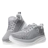 Championes deportivos de tejido de punto en color gris, con diseño de suela gruesa blanca y cierre mediante cordones.