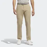 Pantalón de golf Adidas Ultimate365 con corte tapered, color beige. Confeccionado en tejido elástico en cuatro direcciones con acabado repelente al agua y protección UV.