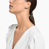 Par de aros stud Swarovski modelo Attract Round, con baño de rodio y cristal blanco. Cierre a presión.
