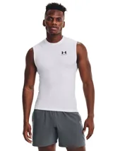 Musculosa térmica Under Armour HeatGear Armour Compression de color blanco, sin mangas y con diseño de compresión. Presenta cuello redondo y el logotipo de la marca estampado en negro en el pecho.