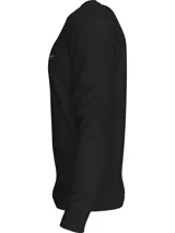 Remera de manga larga negra, confeccionada en punto de algodón gofrado, con cuello redondo y puños de punto. Presenta una pequeña insignia con el monograma de Calvin Klein en el bajo.