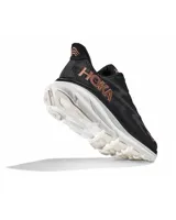Championes de running Hoka Clifton 9, color negro con detalles en bronce y suela blanca.