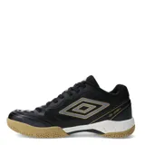 Championes de fútbol sala Umbro modelo Grip Pad, color negro con detalles en dorado y blanco. Presentan una suela de goma color caramelo diseñada para superficies de interior, con refuerzos en la puntera y laterales para mayor durabilidad.