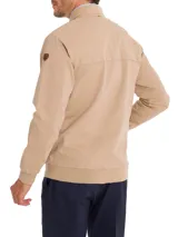 Chaqueta tipo bomber color beige con cierre frontal, cuello, puños y pretina de rib. Cuenta con dos bolsillos laterales y forro interior de franela.