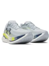 Championes de running Under Armour Velociti Pro 2, color gris con entresuela blanca, detalles en amarillo flúor y azul, y el logo de la marca en el lateral.