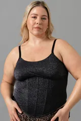 Corset negro con efecto Lurex, sin copa, con ballenas en la parte delantera. Tiene breteles elásticos regulables y broches reforzados en la espalda.