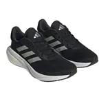 Championes de running Adidas Supernova 3, color negro con detalles plateados y suela blanca.