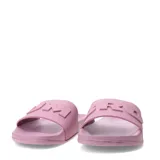 Sandalia tipo slide Umbro modelo Flip, color rosado, con banda ancha superior que presenta el logo de la marca en relieve.