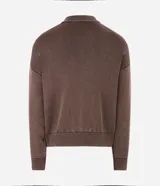 Su&eacute;ter de tricot liviano de algod&oacute;n con efecto marmolado, cuello polo con botones, mangas largas y terminaciones acanaladas.