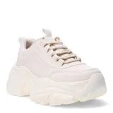 Championes de plataforma Miss Carol, color beige, con diseño chunky y suela dentada de gran volumen. Presentan cordones al tono y tirador en la parte trasera.