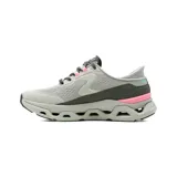 Championes deportivos Skechers Slip-Ins Glide Step Altus de color gris con detalles en rosado, celeste y gris oscuro. Cuenta con tecnología Heel Pillow, parte superior de malla Stretch Fit con cordones ajustables y entresuela geométrica acolchada.